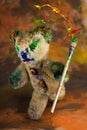 Wizard teddy bear with colorful paintbrush Royalty Free Stock Photo