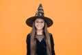 wizardry. halloween witch girl. happy childhood. teenage child in hat and glasses. cheerful kid create miracles