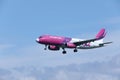 Wizz Air Airbus A320-200 HA-LYE jet flying up in the sky Royalty Free Stock Photo