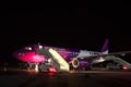 Wizz Air Airbus A320 at night Royalty Free Stock Photo