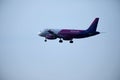 Wizz Air plane in the sky, landing Royalty Free Stock Photo