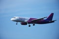 Wizz Air plane in the sky, landing Royalty Free Stock Photo