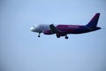 Wizz Air plane in the sky, landing Royalty Free Stock Photo