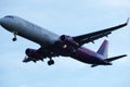 Wizz Air plane in the sky, landing Royalty Free Stock Photo