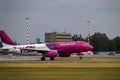 A Wizzair airliner takes off from the runway. Departure of the plane from the airport. Riga International Airport, Marupe, Latvia