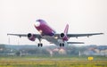 Wizzair commercial airplane takeoff from Otopeni airport in Bucharest Romania Royalty Free Stock Photo