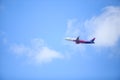 A Wizzair commercial airplane is taking off from the Henri Coanda International Airport.