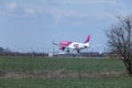 Wizz Air Airbus A320-200 HA-LYE jet landing on runway Royalty Free Stock Photo