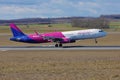 WizzAir plane taking off from runway Royalty Free Stock Photo