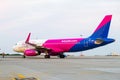 Wizzair plane ready to take off on the runway Royalty Free Stock Photo