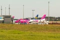 Wizzair and Ryanair aircraft parked on the tarmac. Gdansk, Poland