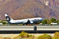 Alaska Airlines Boeing B-737-990ER(WL) taking off from Palm Springs, California