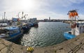 Wladyslawowo, Pomorskie Poland - February, 24, 2021: Fishing boats moored in the port. Port infrastructure in a small town in