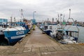 Wladyslawowo, pomorskie / Poland - January, 14, 2020: Fishing port in Central Europe. Entrance to the port and port quay in