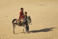 Wo boys and a donkey in the Sahara desert,Tozeur, Tunisia