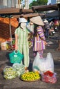 Wo vietnamese women are having a conversation at the street market, Nha Trang, Vietnam
