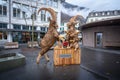 Wodden sculpture of an Ibex Family eating cheese fondue - Interlaken, Switzerland