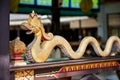 Woden dragon statue at the entrance to Kraton Sultan Palace. Ind Royalty Free Stock Photo