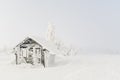 Woden house in mountains under the snow