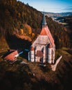 The Wofgangskirche, a gothic Catholic Church in the austrian Village Kirchberg am Wechsel aerial view Royalty Free Stock Photo