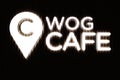 WOG cafe neon signboard. Close-up of WOG cafe logo