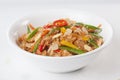 Wok noodles with beef vegetables, ginger, sweet pepper on a plate