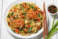 Wok noodles with chicken and tofu on a white plate Royalty Free Stock Photo