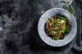 Wok. Soba stir fry noodles with beef and vegetables. Black background. Top view. Copy space Royalty Free Stock Photo