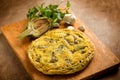 Wole omelet with artichoke with parsley