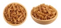 Wolegrain fusilli pasta from durum wheat in wooden bowl isolated on white background with full depth of field. Top view Royalty Free Stock Photo