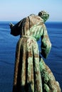 The statue of Saint Francis of Assisi caressing the wolf of Gubbio, Monterosso Al Mare, Cinque Terre, Italy. Royalty Free Stock Photo