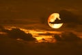 wolf moon back on silhouette heap cloud on sunset sky Royalty Free Stock Photo