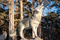 Wolf sculpture in the forest