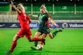 Alexandra Popp of VfL Wolfsburg against two opponents during UWCL soccer match