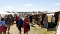 WOLIN, POLAND - AUGUST 6, 2022: XXVII Festival of Slavs and Vikings, reenactors' tents and a crowd of visitors