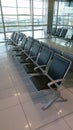 Empty lined up seats at the airport gate Royalty Free Stock Photo