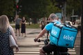 Wolt delivery man driving in belgrade Royalty Free Stock Photo