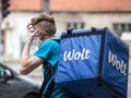 Wolt delivery man wearing a face mask protective respirator in belgrade during the Coronavirus Covid 19 crisis