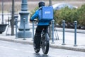 Vilnius/Lithuania March 20, 2019 Wolt courier with bicycle.