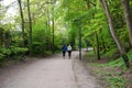 Woluwe-Saint-Lambert, Brussels Capital Region, Belgium - Two girls jogging in the woods