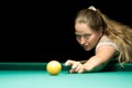 Woma playing billiards