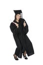 Caucasian woman wearing in a black graduation gown Royalty Free Stock Photo