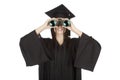 Caucasian woman wearing in a black graduation gown Royalty Free Stock Photo