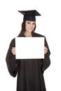 Caucasian woman wearing in a black graduation gown Royalty Free Stock Photo