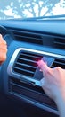 Woman activates car emergency light, man presses red triangle button Royalty Free Stock Photo