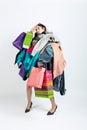 Woman addicted of sales and clothes, overproduction and crazy demand