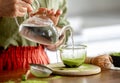 Woman Adding Water To Matcha Tea Royalty Free Stock Photo