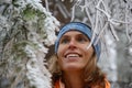 Woman admires covered with rime trees