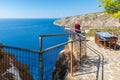 Woman admiring beautiful cliffs of Porto Schiza