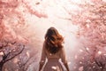 Woman admiring field of blooming cherry blossoms in springtime. Generative AI